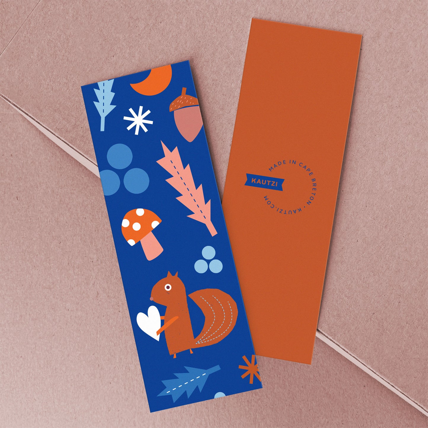 Bookmark Squirrel features woodland illustrations with orange squirrel, mushroom, acorns, and oak leaves on deep blue background