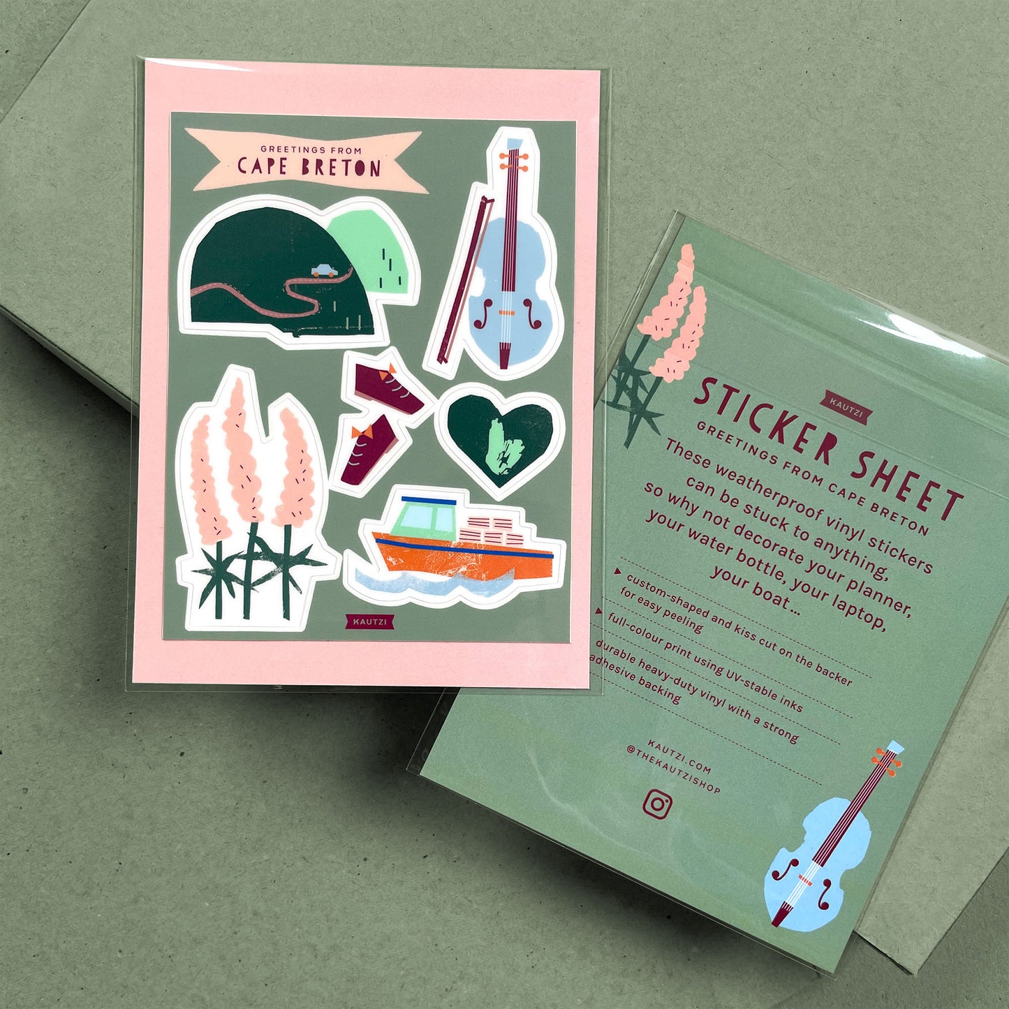 Cape Breton sticker sheet featuring colorful illustrations of fiddle, lobster boat, lupins, and highlands on pink background