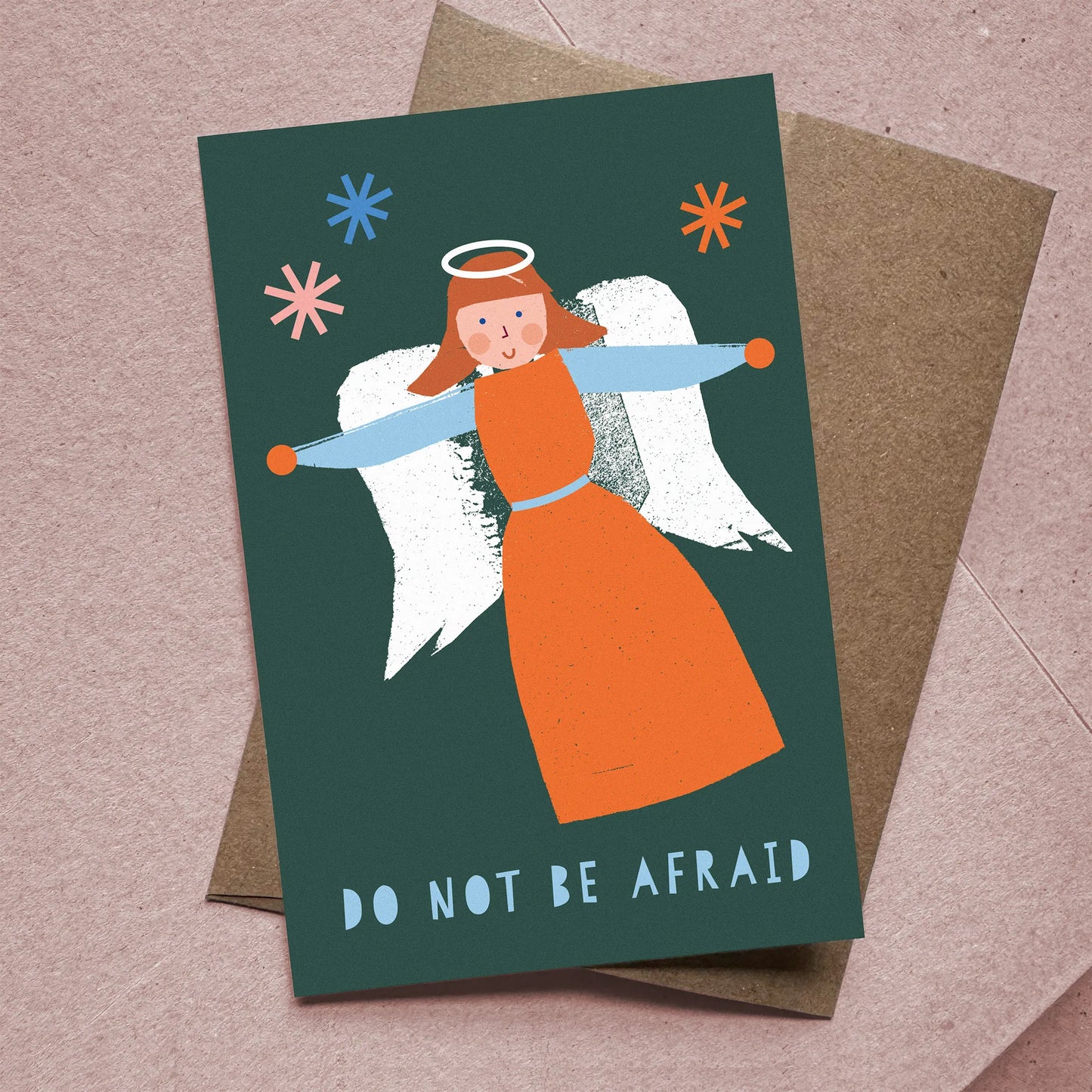 Flat Card – Angel featuring a vibrant orange and blue illustrated angel with "Do Not Be Afraid" text on dark green background.