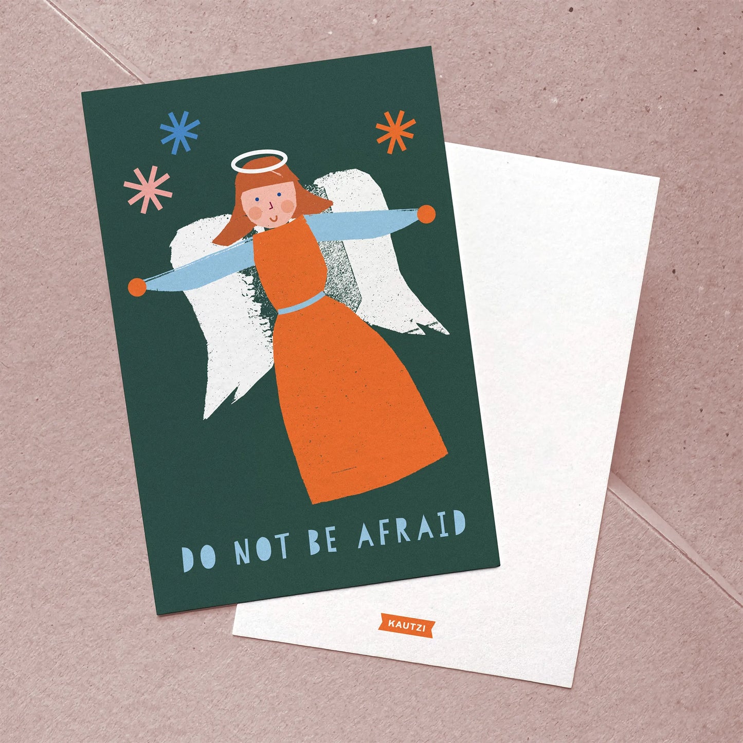 Front and back view of “Do Not Be Afraid” Christmas card featuring angel illustration and minimal back with logo.