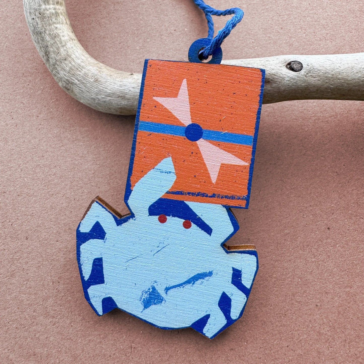 Kautzi blue crab wooden ornament with orange gift box, designed in Cape Breton, Nova Scotia.