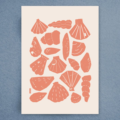 The Beach Combings tea towel by Kautzi, laid flat to display its full design. The pattern features an arrangement of stylized seashells in a warm coral tone, screen-printed on 100% cotton fabric with a soft texture.