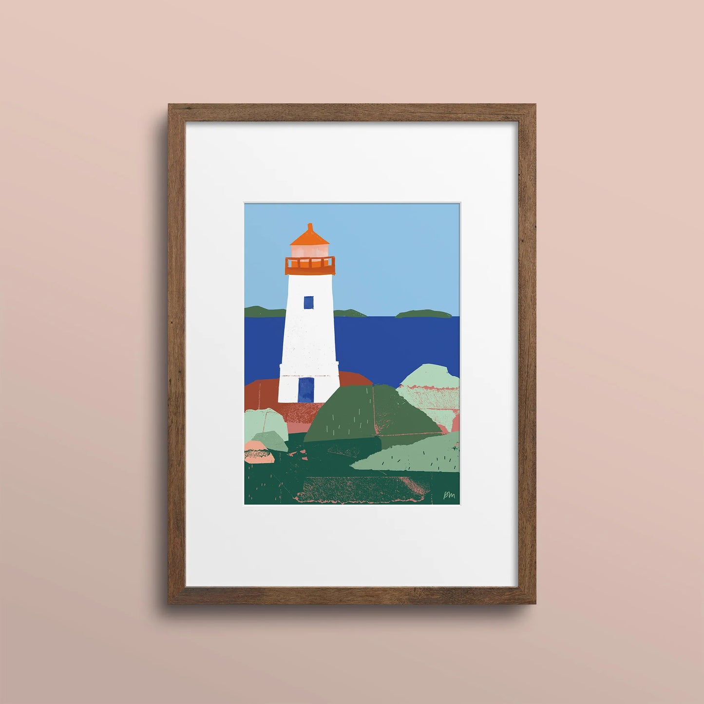 A 5×7 art print of the Louisbourg Lighthouse in Cape Breton, Nova Scotia, displayed in a warm walnut-toned frame with a white mat, mounted on a blush-coloured wall.