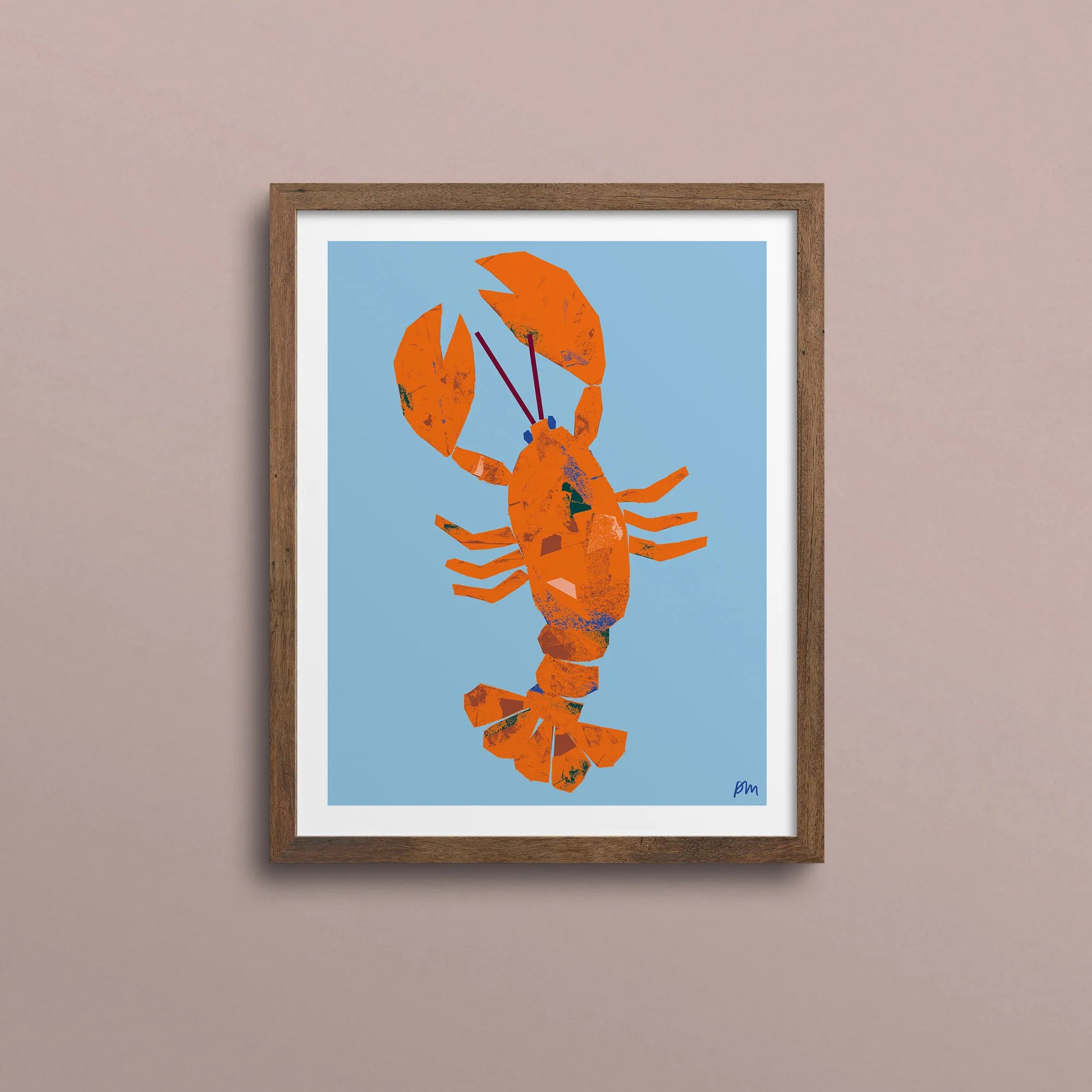 Kautzi Illustrations 8×10 Lobster art print displayed in a wooden frame against a soft pink wall, showing an orange lobster on a light blue background, inspired by East Coast and Maritime imagery.