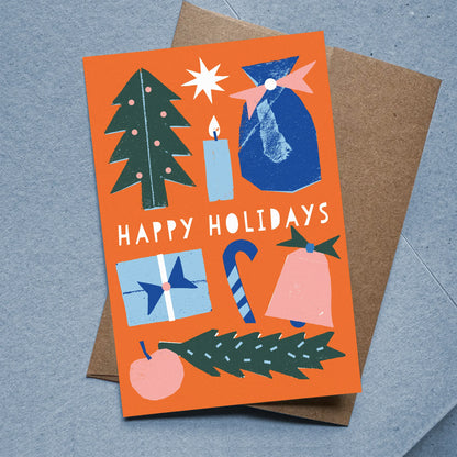 Flat Card – Happy Holidays with colorful holiday icons on orange background, kraft envelope included, designed by Kautzi.
