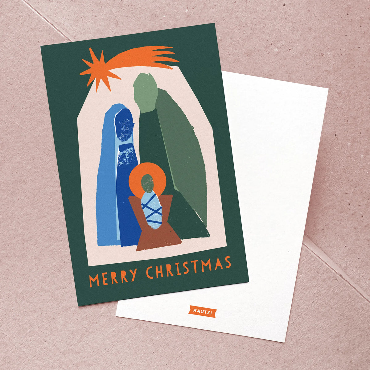 Front and back of the Kautzi Silent Night "Merry Christmas" greeting card featuring a modern abstract nativity illustration with a star of Bethlehem in teal, blue, and orange on a dark green background; back shows the Kautzi logo printed on white. Designed and made in Canada