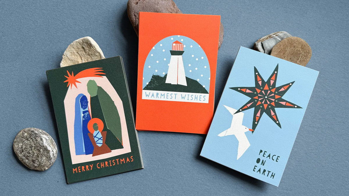 Kautzi paper-cut Christmas cards, made in Cape Breton, Nova Scotia: nativity, lighthouse and peace dove designs