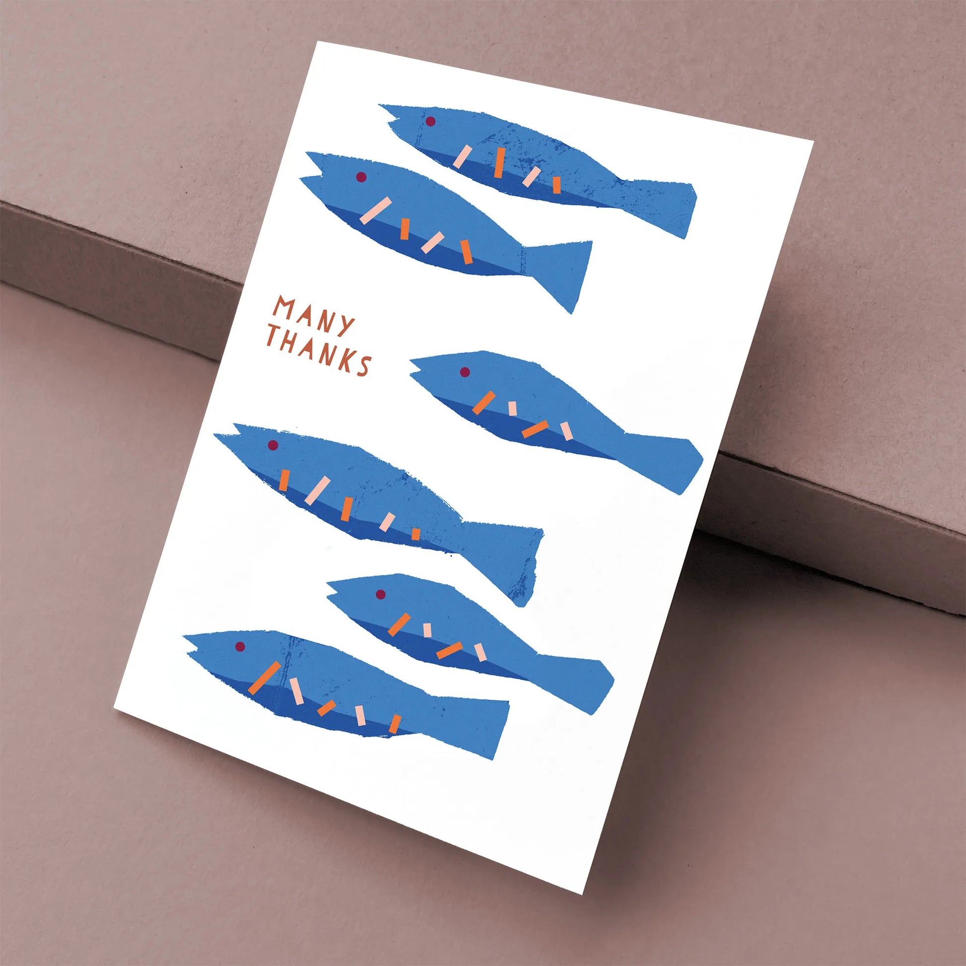 Kautzi thank you greeting card with blue fish illustration and “Many Thanks” text, modern graphic design, Cape Breton, Nova Scotia, Canada