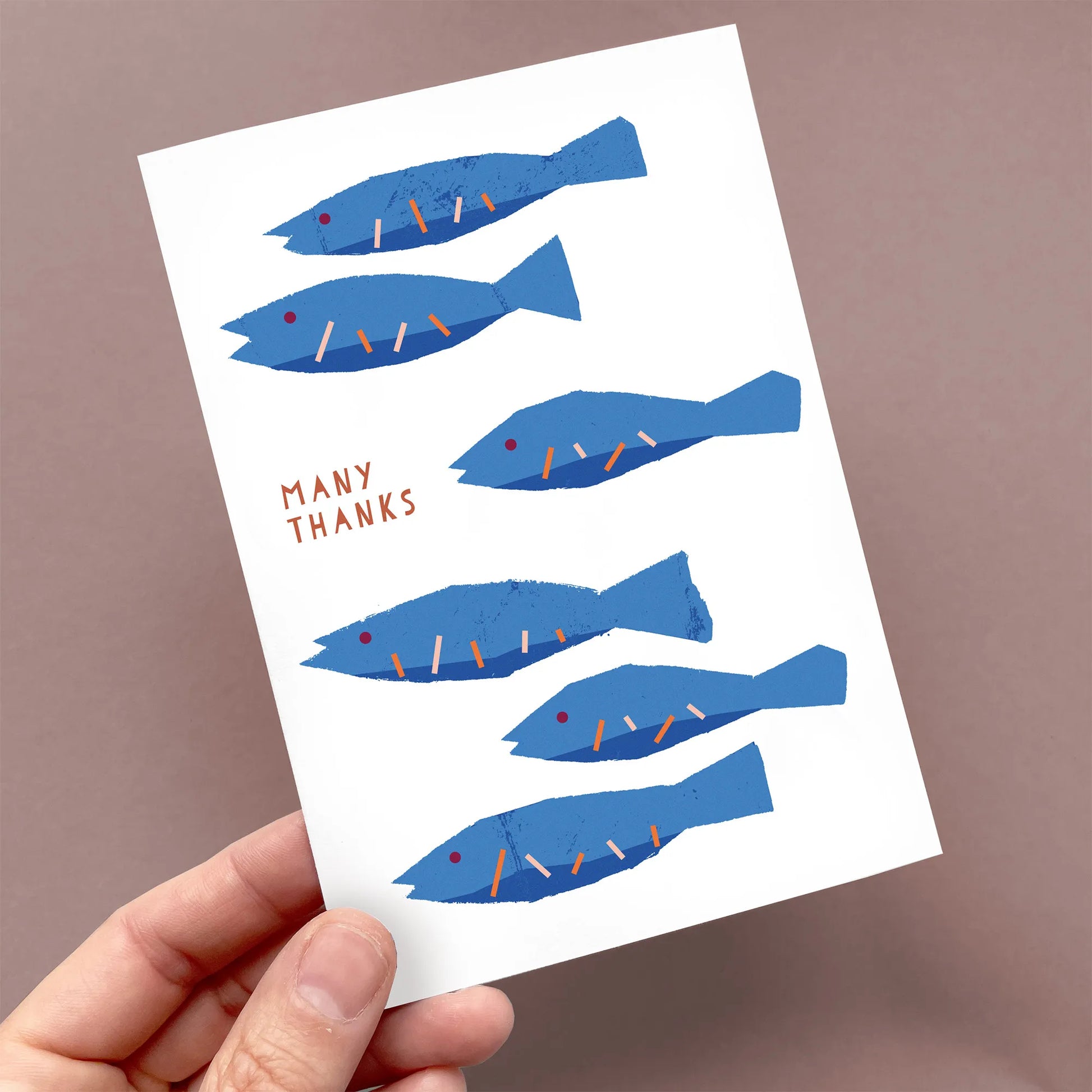 Kautzi many thanks greeting card with blue fish illustration held in hand, modern design, Cape Breton, Nova Scotia, Canada