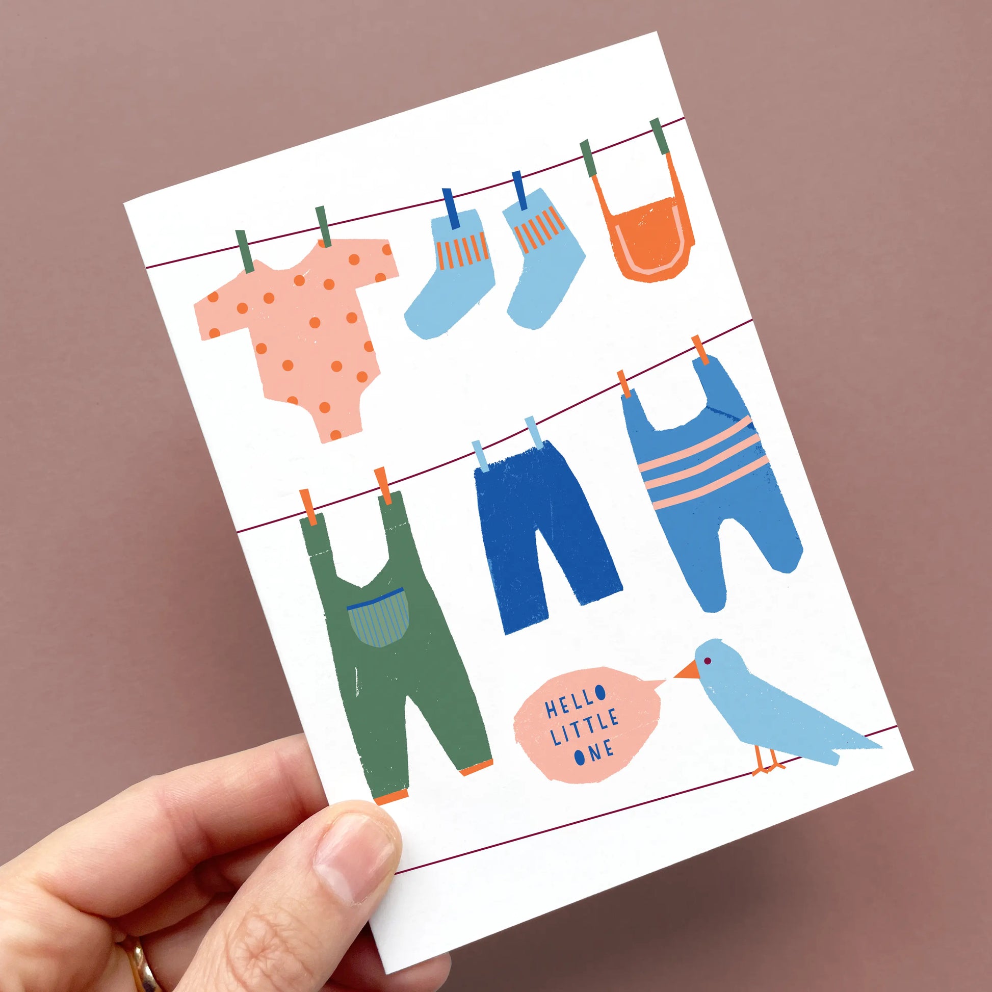Kautzi Hello Little One baby card, illustrated baby clothes on clothesline – Cape Breton, Nova Scotia.