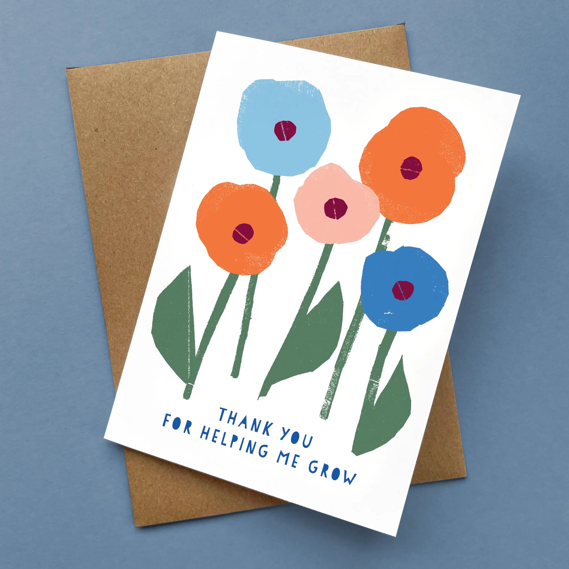 Kautzi thank-you card, floral illustration with blue and orange blooms – papercut design, Cape Breton, Nova Scotia.