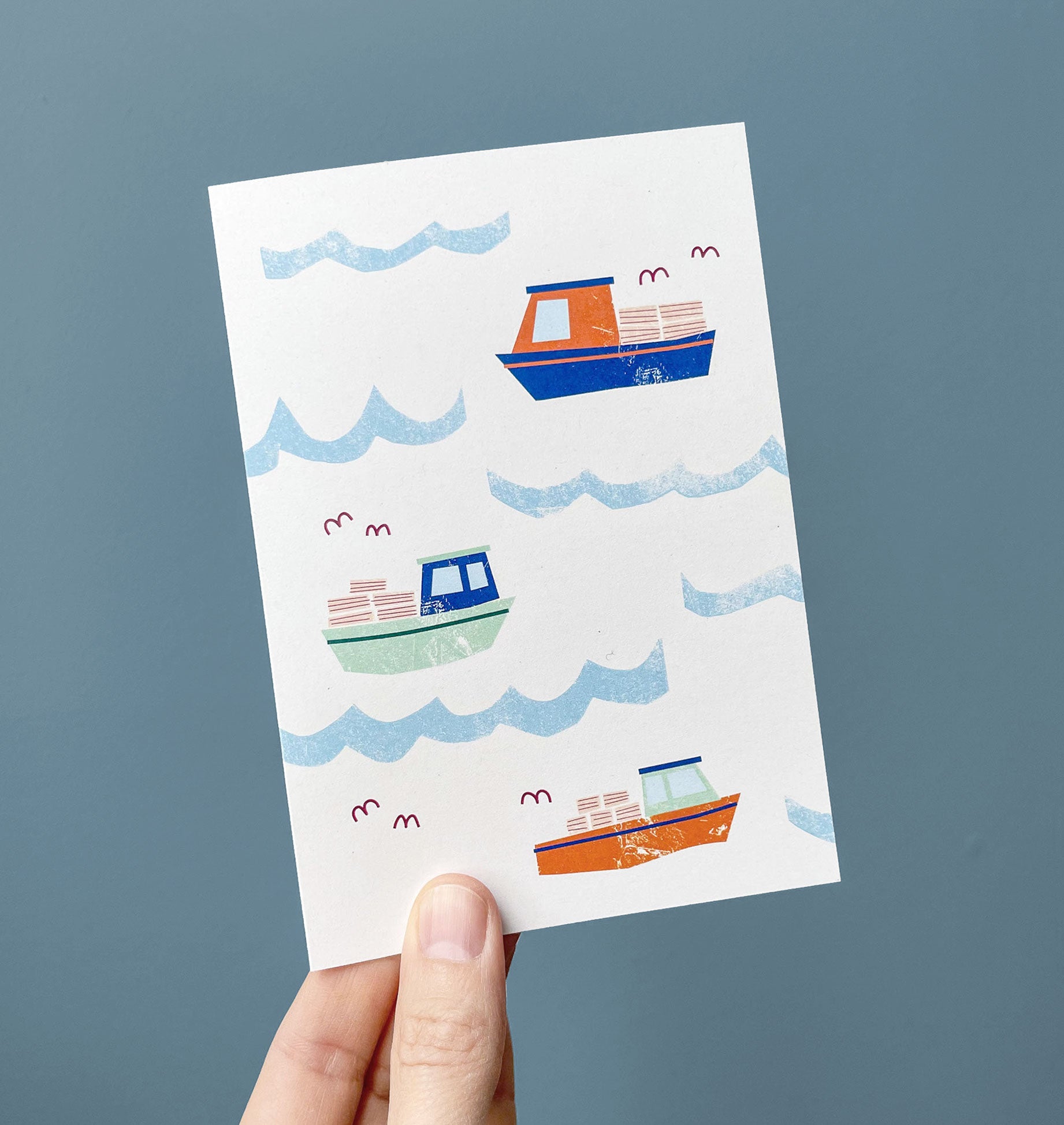 Kautzi lobster boats card with handheld – Nova Scotia coastal design.