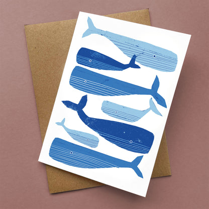 Kautzi whale greeting card, blue whales on white recycled paper – Nova Scotia Maritime papercut illustration.