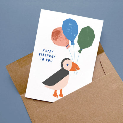 Kautzi puffin birthday card with brown Kraft envelope, modern illustrated greeting card, designed in Cape Breton, Nova Scotia, Canada.