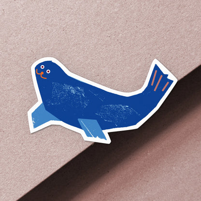 Kautzi blue seal vinyl sticker with orange details, weatherproof matte finish, designed in Cape Breton Canada