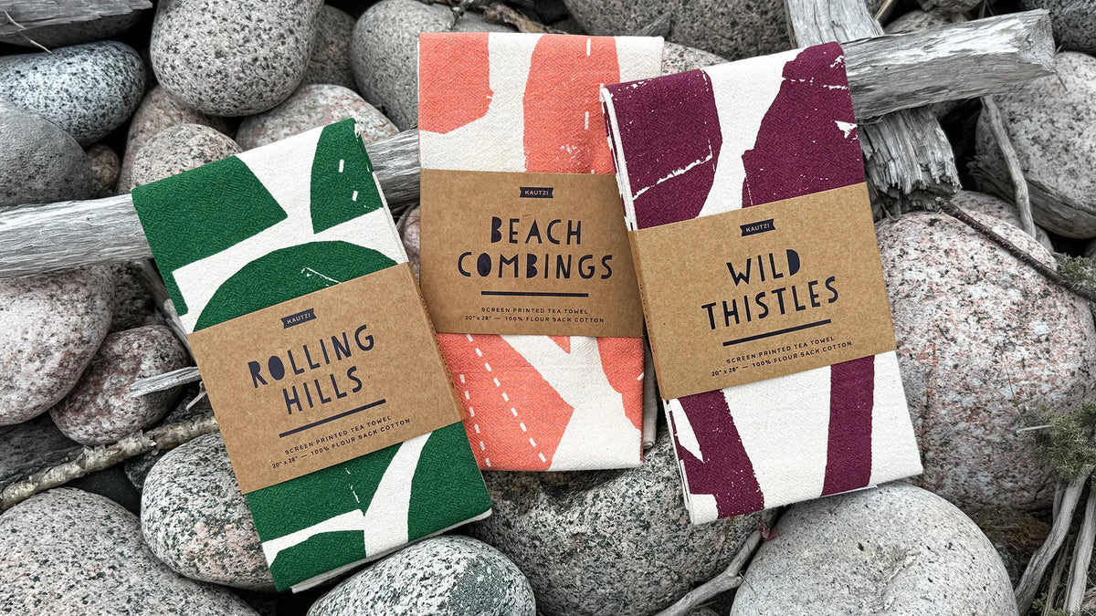 Kautzi tea towels designed in Cape Breton, Nova Scotia, on beach stones: Rolling Hills, Beach Combings, Wild Thistles