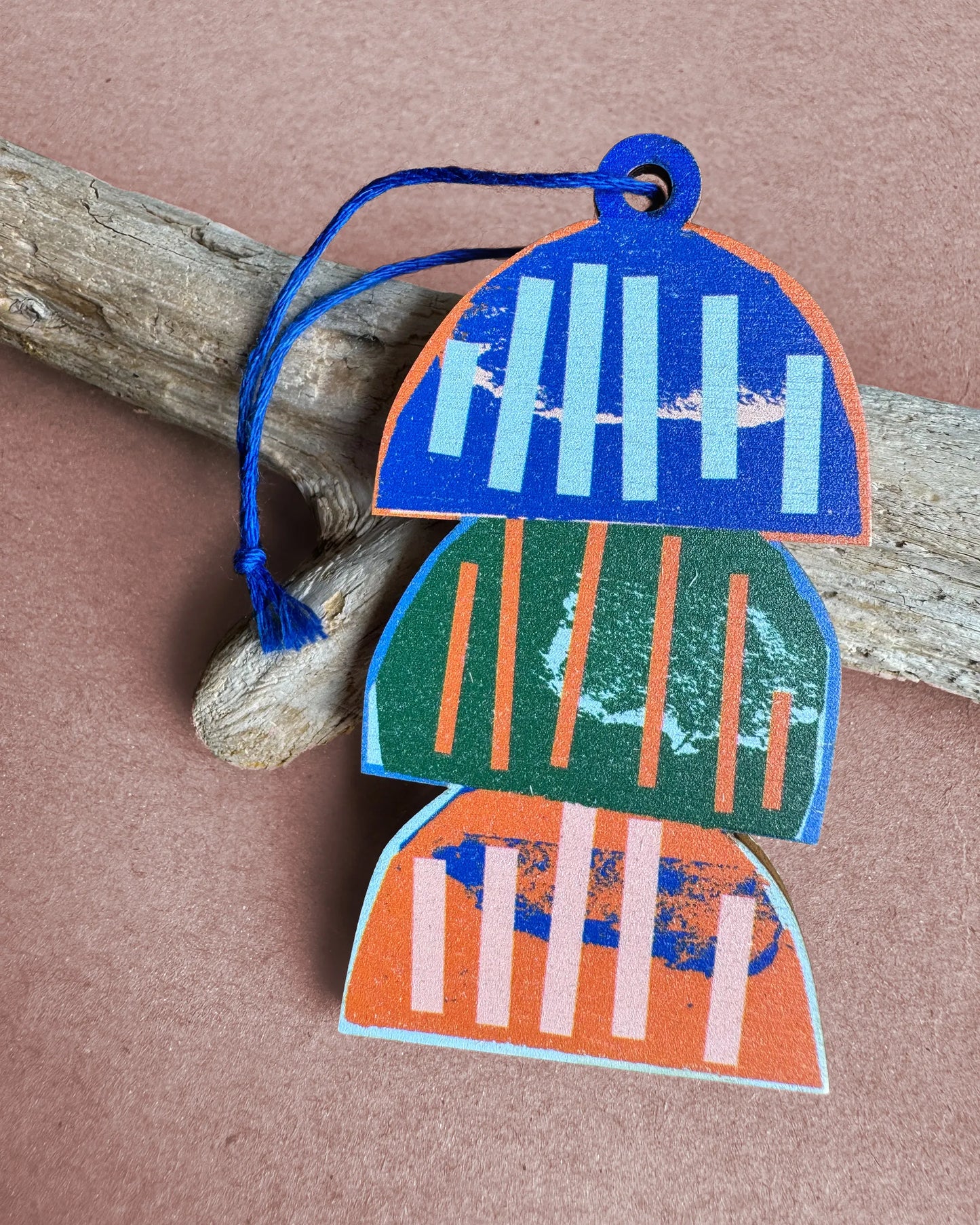 Kautzi wooden ornament featuring three stacked lobster traps in blue, green, and orange, designed in Cape Breton, Nova Scotia.