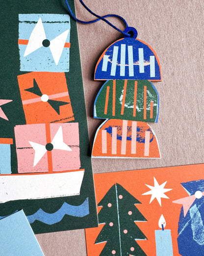 Kautzi East Coast lobster trap ornament displayed with colourful Christmas cards featuring maritime motifs.